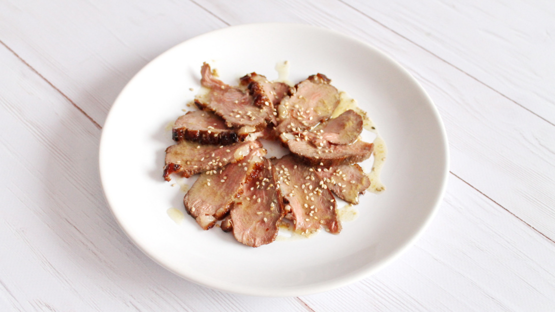 Duck breast carpaccio with sesame seed oil and chili mustard sauce