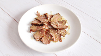 Duck breast carpaccio with sesame seed oil and chili mustard sauce