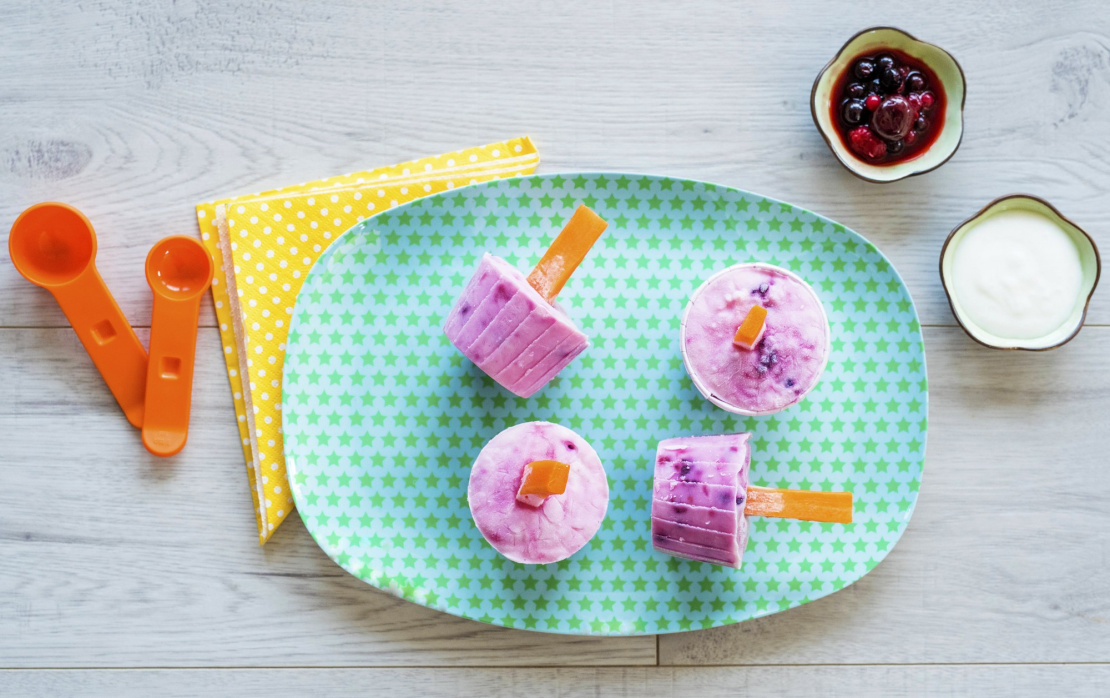 Fruit yoghurt ice cream with carrot sticks